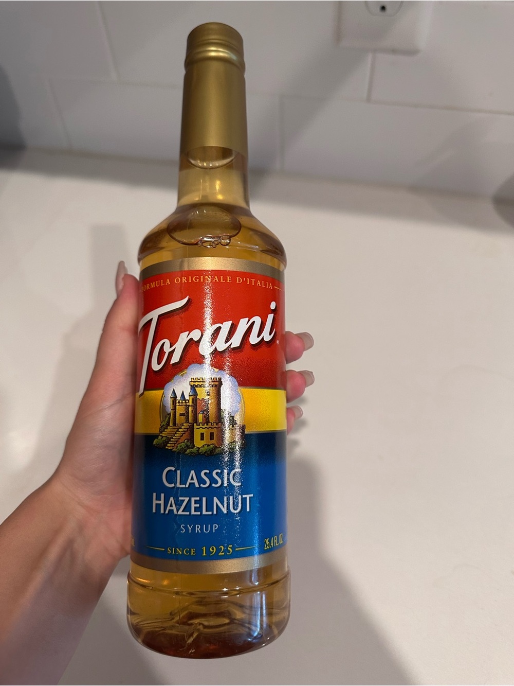 Torani Classic Hazelnut Syrup - Gold & Blue Bottle
